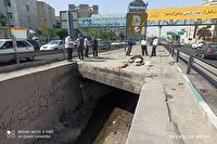 پاکسازی محل‌های پرخطر در مسیل باقری منطقه ۸ تهران